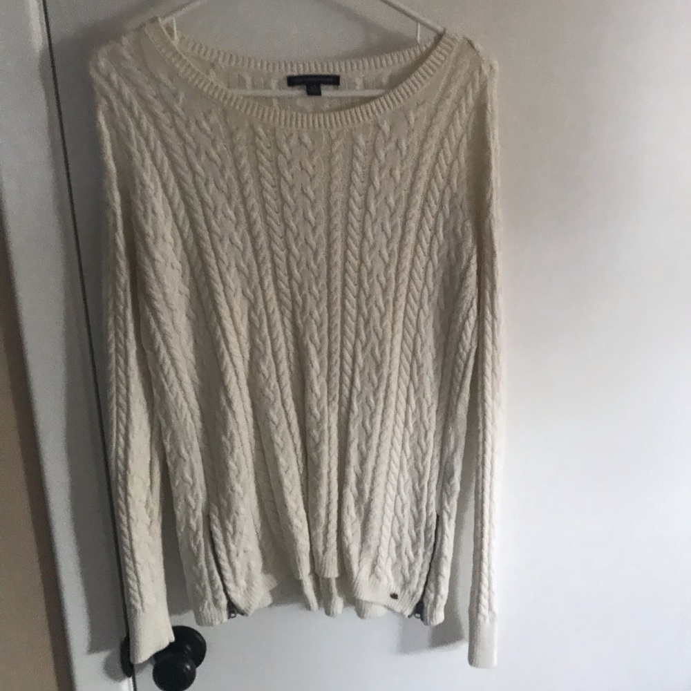 Sweater with side zipper details
